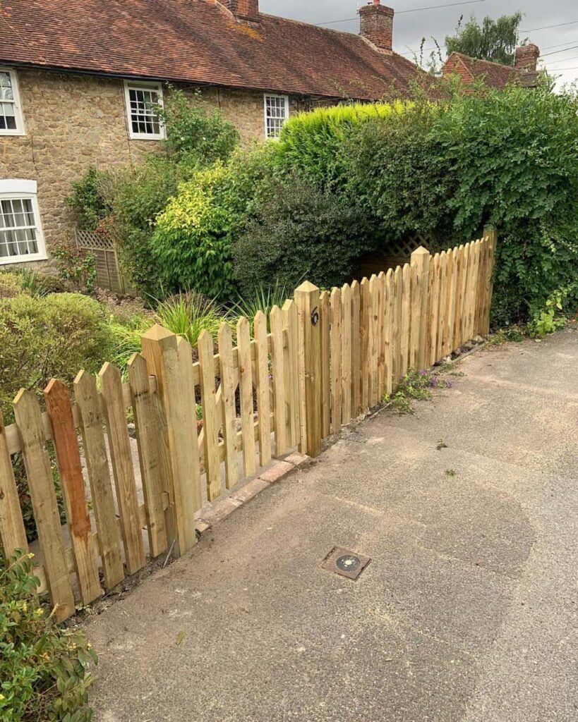 This is a photo of a picket fence and picket gate installed by Fast Fix Fencing Wimblington
